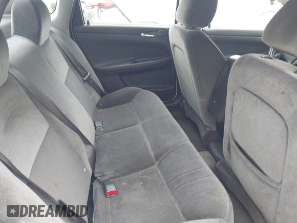 2014 Chevrolet Impala LS with VIN 2G1WA5E31E1163087, listed as a IAAI auction lot 41895666 with 138,348 mi miles and . Bid and sale history available at DreamBid. Image 8.