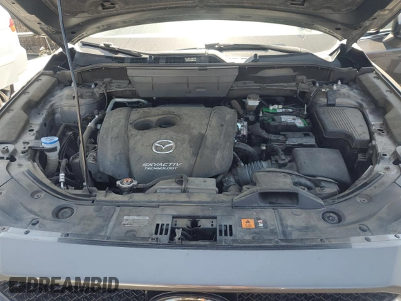2018 Mazda CX-5 Grand Touring with VIN JM3KFADM3J1389911, listed as a Copart auction lot 60530295 with 103,177 mi miles and Salvage title. Bid and sale history available at DreamBid. Image 12.