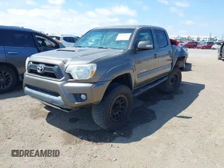 2015 Toyota Tacoma PreRunner with VIN 3TMJU4GN8FM185826, listed as a IAAI auction lot 42181952 with 229,936 mi miles and . Bid and sale history available at DreamBid. Image 2.