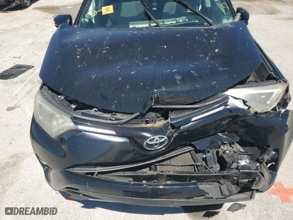 2016 Toyota RAV4 XLE with VIN 2T3WFREV7GW284850, listed as a Copart auction lot 50440815 with 133,409 mi miles and Salvage Title. Bid and sale history available at carsss.com. Image 13.