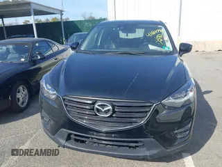 2016 Mazda CX-5 Grand Touring with VIN JM3KE4DY5G0681436, listed as a IAAI auction lot 41664780 with 172,199 mi miles. Bid and sale history available at carsss.com. Image 12.
