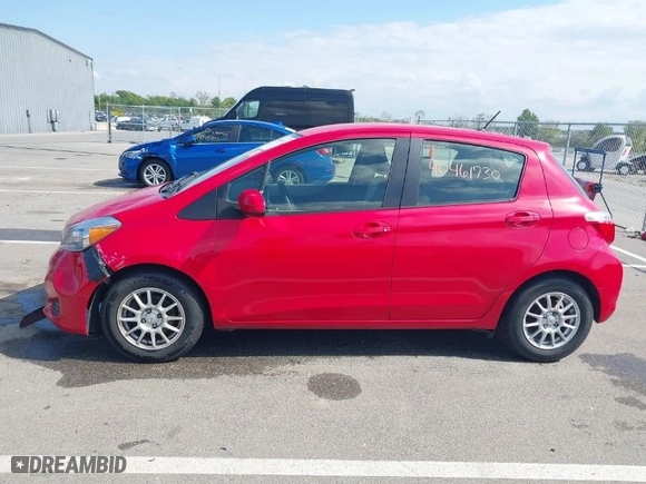 2014 Toyota Yaris L with VIN JTDKTUD36ED592371, listed as a IAAI auction lot 40461730 with 164,423 mi miles. Bid and sale history available at carsss.com. Image 14.