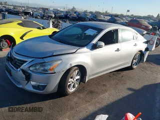 2015 Nissan Altima 2.5 SL with VIN 1N4AL3AP7FC201660, listed as a IAAI auction lot 41345061 with 132,395 mi miles. Bid and sale history available at carsss.com. Image 2.