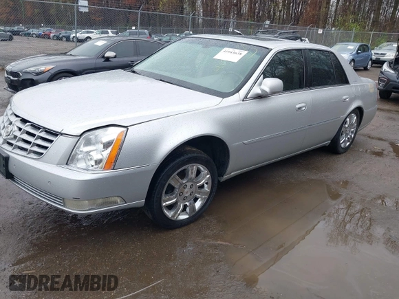 2011 Cadillac DTS Luxury Collection z VIN 1G6KD5E6XBU107790, wystawiony jako IAAI lot #41943638 z przebiegiem 150 543 mil mil oraz . Historia ofert i sprzedaży dostępna na DreamBid. Obrazek 2.