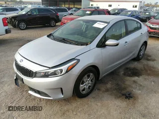 2018 Kia Forte LX with VIN 3KPFK4A79JE210080, listed as a IAAI auction lot 40681931 with 124,986 mi miles and . Bid and sale history available at DreamBid. Image 2.