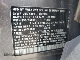 2012 Volkswagen Tiguan SE z VIN WVGAV7AX4CW001417, wystawiony jako Copart lot #61105865 z przebiegiem 168 110 mil mil oraz Czysty tytuł • Clean title. Historia ofert i sprzedaży dostępna na DreamBid. Obrazek 12.