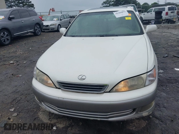 2001 Lexus ES 300 z VIN JT8BF28G410307451, wystawiony jako IAAI lot #42369871 z przebiegiem 290 620 mil mil oraz . Historia ofert i sprzedaży dostępna na DreamBid. Obrazek 12.