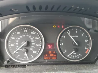 2012 BMW X5 35i with VIN 5UXZV4C50CL991452, listed as a Copart auction lot 56890265 with 147,019 mi miles and Salvage title. Bid and sale history available at DreamBid. Image 9.