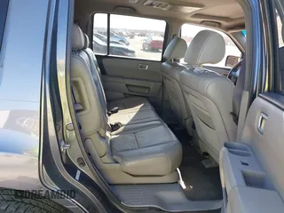 2011 Honda Pilot EX-L with VIN 5FNYF3H64BB056071, listed as a IAAI auction lot 41841047 with 112,114 mi miles and . Bid and sale history available at carsss.com. Image 8.