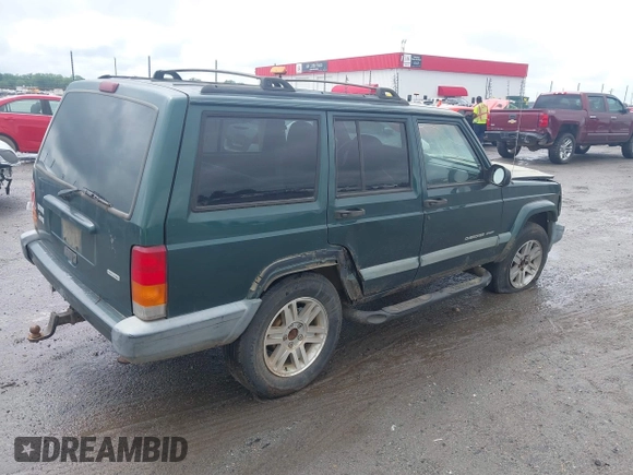 2000 Jeep Cherokee with VIN 1J4FT48S4YL240347, listed as a IAAI auction lot 42361311 with Not provided miles and . Bid and sale history available at DreamBid. Image 4.