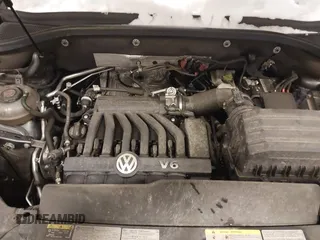 2020 Volkswagen Atlas SE with VIN 1V26E2CA9LC230374, listed as a IAAI auction lot 41336609 with 52,500 mi miles and . Bid and sale history available at DreamBid. Image 10.