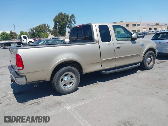 2000 Ford F-150 XL with VIN 1FTRX17L7YKA00540, listed as a IAAI auction lot 42739489 with Not provided miles and . Bid and sale history available at DreamBid. Image 4.