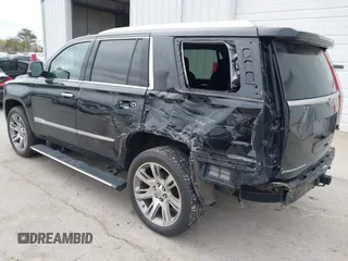 2018 Cadillac Escalade Premium Luxury z VIN 1GYS4CKJ1JR279129, wystawiony jako IAAI lot #42183231 z przebiegiem 130 086 mil mil oraz . Historia ofert i sprzedaży dostępna na DreamBid. Obrazek 3.