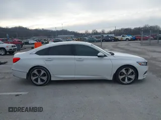 2020 Honda Accord Touring with VIN 1HGCV2F96LA011360, listed as a IAAI auction lot 41192112 with 64,643 mi miles and . Bid and sale history available at DreamBid. Image 14.