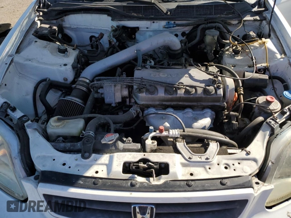 2000 Honda Civic DX z VIN 1HGEJ6225YL080394, wystawiony jako Copart lot #73515634 z przebiegiem 141 139 mil mil oraz Szkoda całkowita • Salvage title. Historia ofert i sprzedaży dostępna na DreamBid. Obrazek 11.