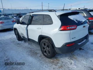 2016 Jeep Cherokee Latitude with VIN 1C4PJMCB7GW304109, listed as a IAAI auction lot 41330879 with 114,503 mi miles. Bid and sale history available at carsss.com. Image 3.