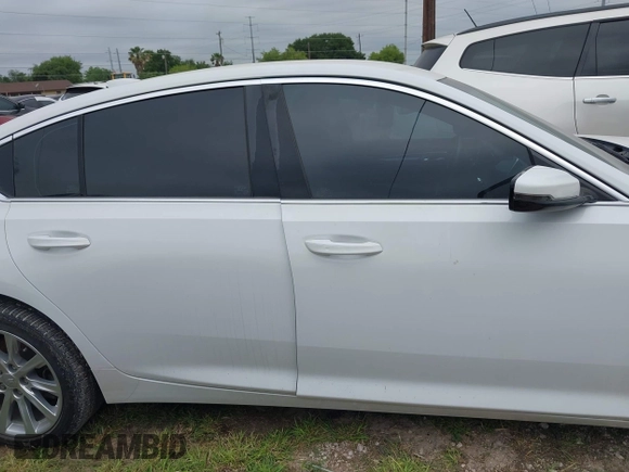 2020 Cadillac CT5 Luxury z VIN 1G6DM5RK3L0146892, wystawiony jako IAAI lot #41928395 z przebiegiem 65 849 mil mil oraz . Historia ofert i sprzedaży dostępna na DreamBid. Obrazek 13.