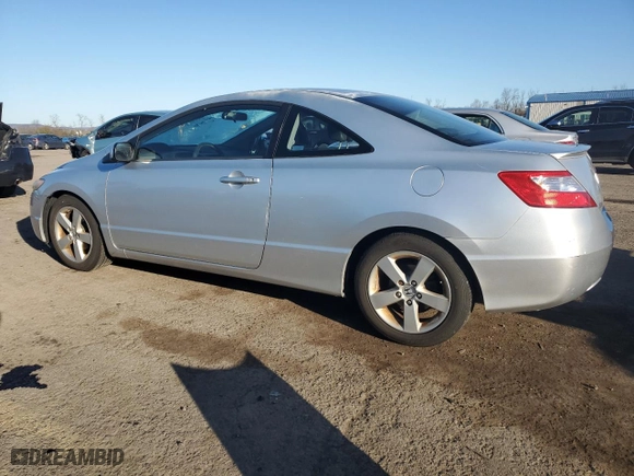 2008 Honda Civic Cpe EX-L with VIN 2HGFG12908H547530, listed as a Copart auction lot 50974715 with 128,597 mi miles and Salvage Title. Bid and sale history available at carsss.com. Image 2.