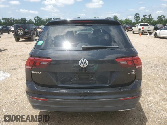 2018 Volkswagen Tiguan S с VIN 3VV0B7AX2JM114189, выставлен на аукционе Copart как лот 56109665 с пробегом 65 432 миль миль и Списание • Salvage title. История ставок и продаж доступна на DreamBid. Изображение 6.