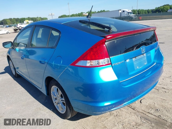 2010 Honda Insight EX with VIN JHMZE2H74AS013148, listed as a IAAI auction lot 42194894 with 114,885 mi miles and . Bid and sale history available at DreamBid. Image 3.