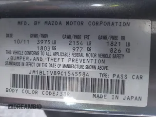 2012 Mazda Mazda3 i Touring with VIN JM1BL1V89C1545584, listed as a IAAI auction lot 41953481 with 190,831 mi miles. Bid and sale history available at carsss.com. Image 9.
