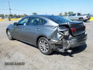 2017 Infiniti Q70 3.7 with VIN JN1BY1AP1HM740652, listed as a IAAI auction lot 42417772 with 81,723 mi miles and . Bid and sale history available at DreamBid. Image 3.