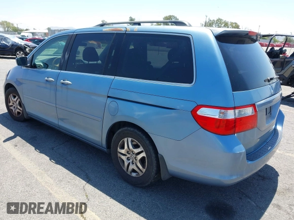 2005 Honda Odyssey EX-L with VIN 5FNRL38785B110823, listed as a IAAI auction lot 42154177 with 195,298 mi miles. Bid and sale history available at carsss.com. Image 3.