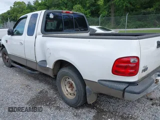 2003 Ford F-150 XL with VIN 1FTRX07WX3KD86058, listed as a IAAI auction lot 42502946 with Not provided miles and . Bid and sale history available at DreamBid. Image 3.