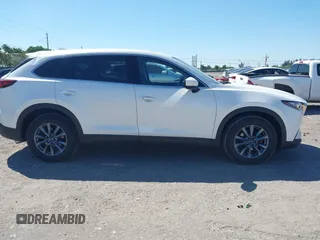 2020 Mazda CX-9 Touring with VIN JM3TCACY6L0403584, listed as a IAAI auction lot 41784589 with 55,328 mi miles and . Bid and sale history available at DreamBid. Image 13.
