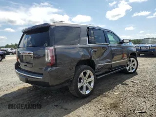 2017 GMC Yukon Denali with VIN 1GKS2CKJ3HR360319, listed as a Copart auction lot 70051014 with 127,896 mi miles and Salvage Title. Bid and sale history available at carsss.com. Image 3.