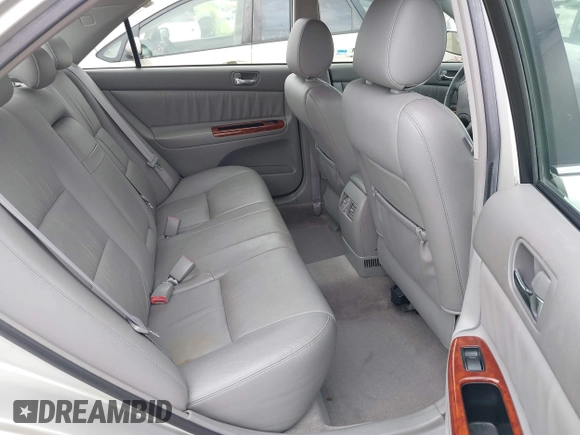 2005 Toyota Camry LE with VIN JTDBF30K650163057, listed as a IAAI auction lot 41730270 with 98,300 mi miles and . Bid and sale history available at DreamBid. Image 8.