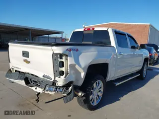 2015 Chevrolet Silverado 1500 High Country with VIN 3GCUKTEC9FG167929, listed as a IAAI auction lot 41668399 with 220,194 mi miles. Bid and sale history available at carsss.com. Image 4.