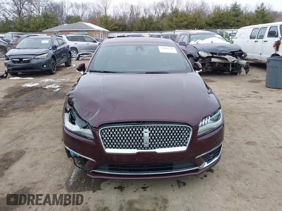2017 Lincoln MKZ Select z VIN 3LN6L5CC3HR620854, wystawiony jako IAAI lot #41042376 z przebiegiem 131 517 mil mil oraz . Historia ofert i sprzedaży dostępna na DreamBid. Obrazek 12.