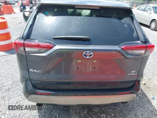 2023 Toyota RAV4 Hybrid SE with VIN JTM16RFV9PD113152, listed as a IAAI auction lot 42177056 with 41,204 mi miles and . Bid and sale history available at DreamBid. Image 15.