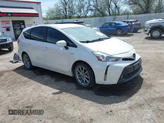 2016 Toyota Prius Two z VIN JTDZN3EU6GJ047561, wystawiony jako IAAI lot #42143291 z przebiegiem 142 075 mil mil oraz . Historia ofert i sprzedaży dostępna na DreamBid. Obrazek 1.