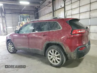 2016 Jeep Cherokee Limited with VIN 1C4PJMDSXGW318746, listed as a Copart auction lot 52601625 with 198,354 mi miles and Salvage title. Bid and sale history available at DreamBid. Image 2.