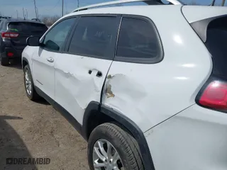 2020 Jeep Cherokee Latitude with VIN 1C4PJLCB1LD596646, listed as a IAAI auction lot 41822600 with 98,797 mi miles. Bid and sale history available at carsss.com. Image 6.