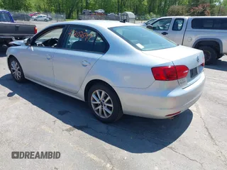 2012 Volkswagen Jetta SE with VIN 3VWDP7AJ8CM465069, listed as a IAAI auction lot 42202597 with 106,963 mi miles and . Bid and sale history available at DreamBid. Image 3.