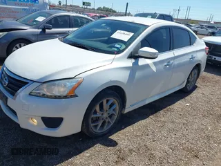 2015 Nissan Sentra SR with VIN 3N1AB7AP4FY267713, listed as a IAAI auction lot 41630409 with 99,919 mi miles and . Bid and sale history available at DreamBid. Image 2.