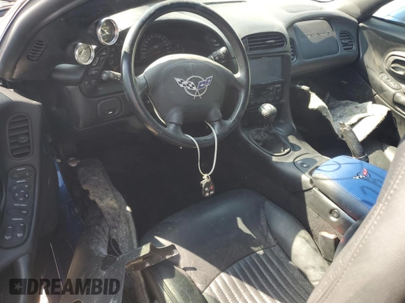 2002 Chevrolet Corvette Z06 z VIN 1G1YY12S725106363, wystawiony jako Copart lot #74213194 z przebiegiem Nie podano mil oraz Nie do naprawy. Historia ofert i sprzedaży dostępna na DreamBid. Obrazek 8.
