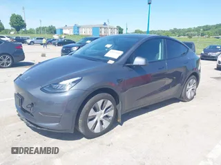 2023 Tesla Model Y Long Range with VIN 7SAYGDEE4PA037218, listed as a IAAI auction lot 42232704 with 18,756 mi miles and . Bid and sale history available at DreamBid. Image 22.