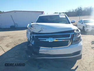 2015 Chevrolet Tahoe LT with VIN 1GNSCBKC0FR104096, listed as a IAAI auction lot 41679298 with 231,005 mi miles and . Bid and sale history available at DreamBid. Image 6.