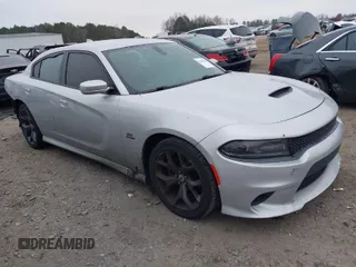 2019 Dodge Charger R/T with VIN 2C3CDXCT2KH605656, listed as a IAAI auction lot 41464186 with 118,254 mi miles and . Bid and sale history available at carsss.com. Image 1.