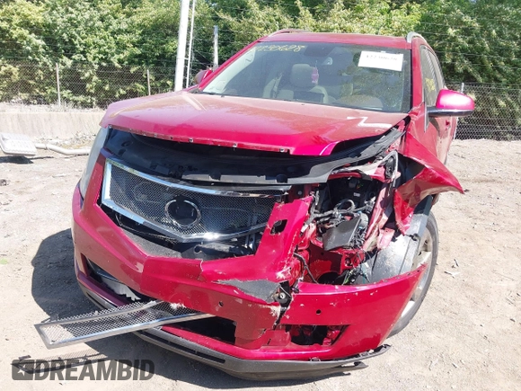 2012 Cadillac SRX Premium Collection with VIN 3GYFNFE35CS579477, listed as a IAAI auction lot 42230628 with 138,789 mi miles and . Bid and sale history available at DreamBid. Image 12.