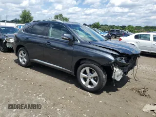 2010 Lexus RX 350 with VIN 2T2BK1BA0AC021772, listed as a Copart auction lot 61842575 with 183,710 mi miles and Salvage title. Bid and sale history available at DreamBid. Image 4.
