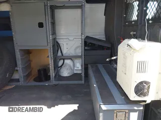 2009 Ford Econoline Cargo with VIN 1FTNE24L59DA13632, listed as a IAAI auction lot 42557559 with 90,487 mi miles and . Bid and sale history available at DreamBid. Image 8.