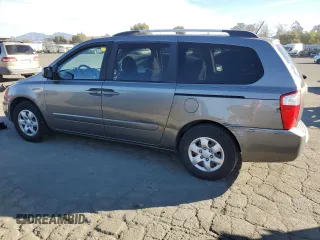 2010 Kia Sedona LX with VIN KNDMG4C39A6351207, listed as a Copart auction lot 76838564 with 210,642 mi miles and Salvage Title. Bid and sale history available at carsss.com. Image 2.