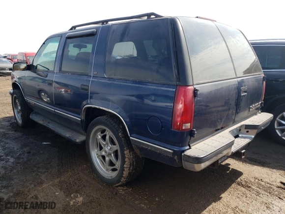1999 Chevrolet Tahoe Z71 with VIN 1GNEK13R2XJ523810, listed as a Copart auction lot 64247874 with 151,373 mi miles and Salvage Title. Bid and sale history available at carsss.com. Image 2.