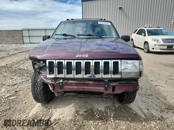 1994 Jeep Grand Cherokee Laredo z VIN 1J4GZ58S0RC221854, wystawiony jako Copart lot #61950825 z przebiegiem 69 465 mil mil oraz Czysty tytuł • Clean title. Historia ofert i sprzedaży dostępna na DreamBid. Obrazek 5.