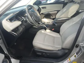 2013 Toyota Avalon XLE with VIN 4T1BK1EB6DU037938, listed as a Copart auction lot 62709525 with 104,616 mi miles and Salvage title. Bid and sale history available at DreamBid. Image 7.